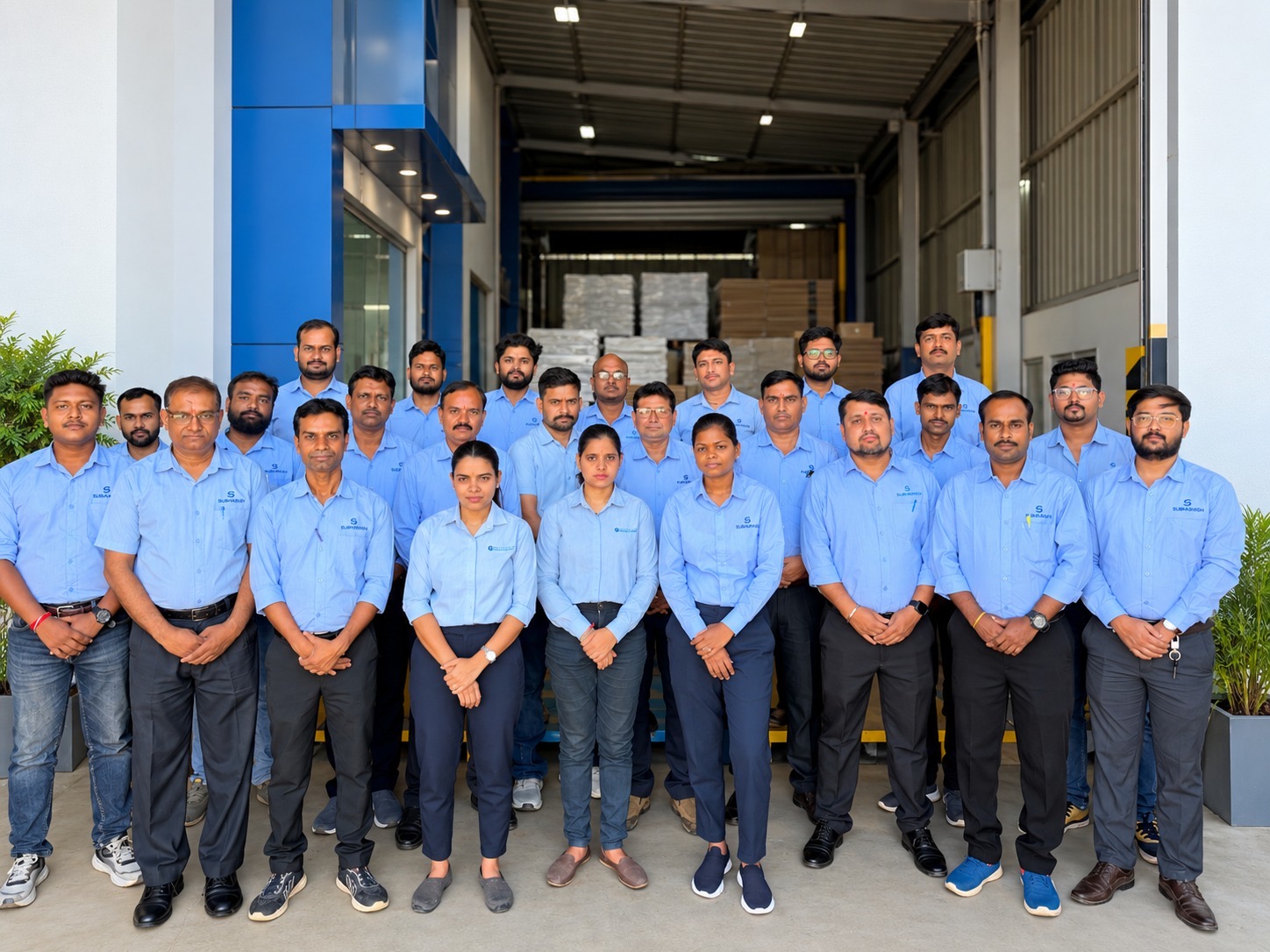 Members of the Subhashish team at the manufacturing facility